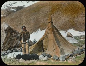 Image: Ahl-ning-wah Standing in front of Tent
